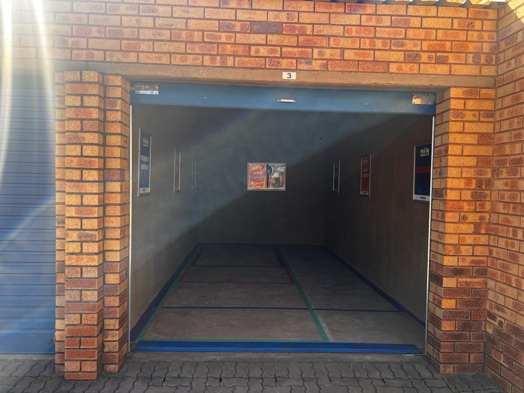 Clean and empty storage unit prepared for customer belongings